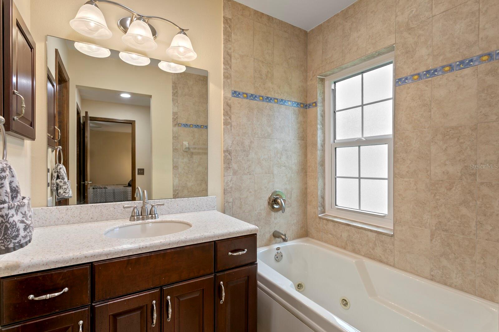 Jacuzzi tub in primary bathroom
