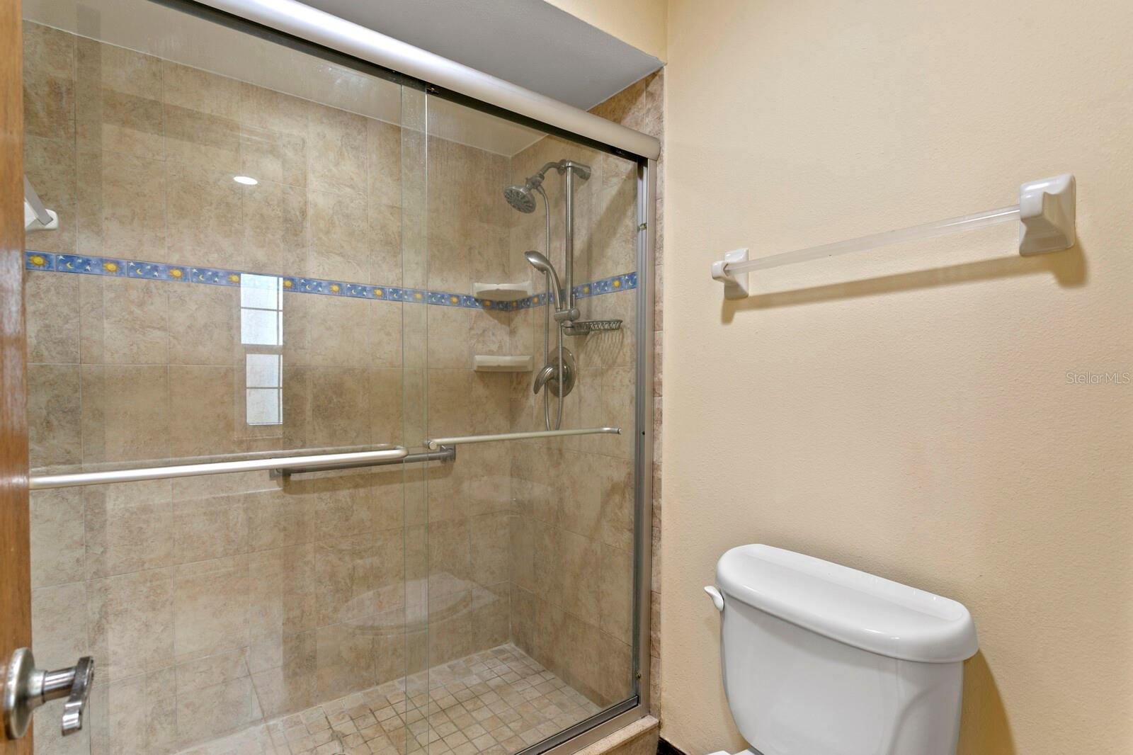 Separate walk-in shower in primary bath
