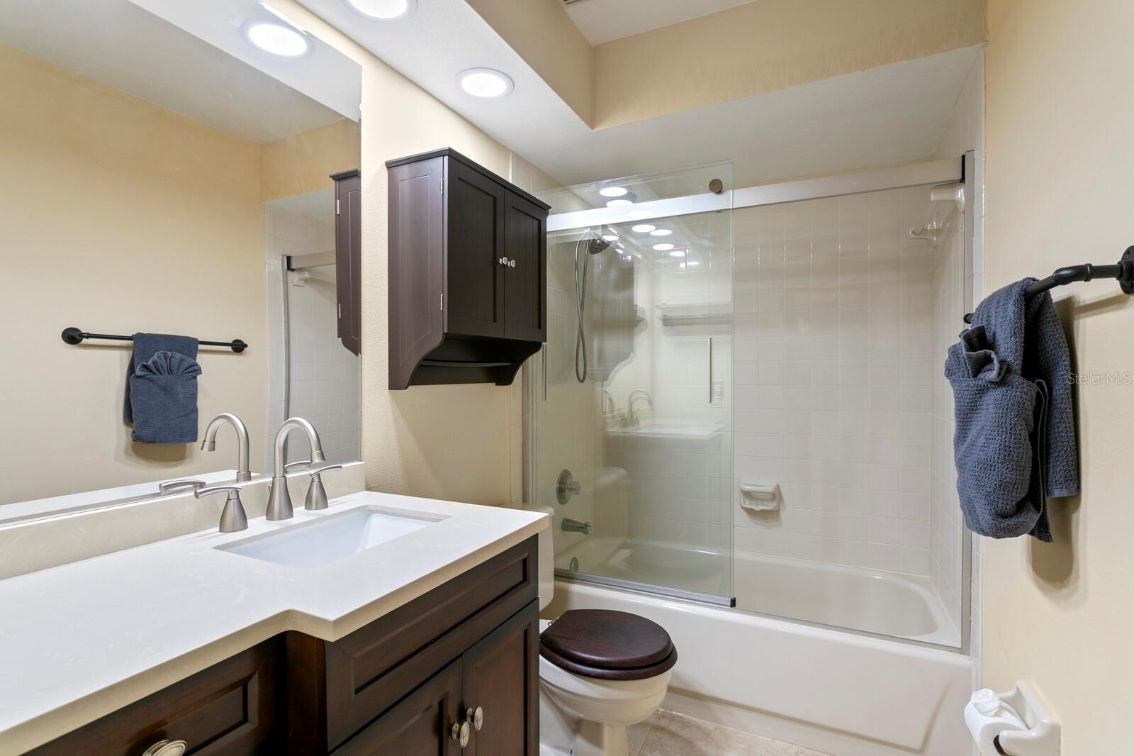 Updated 3rd full bath adjacent to 4th bedroom
