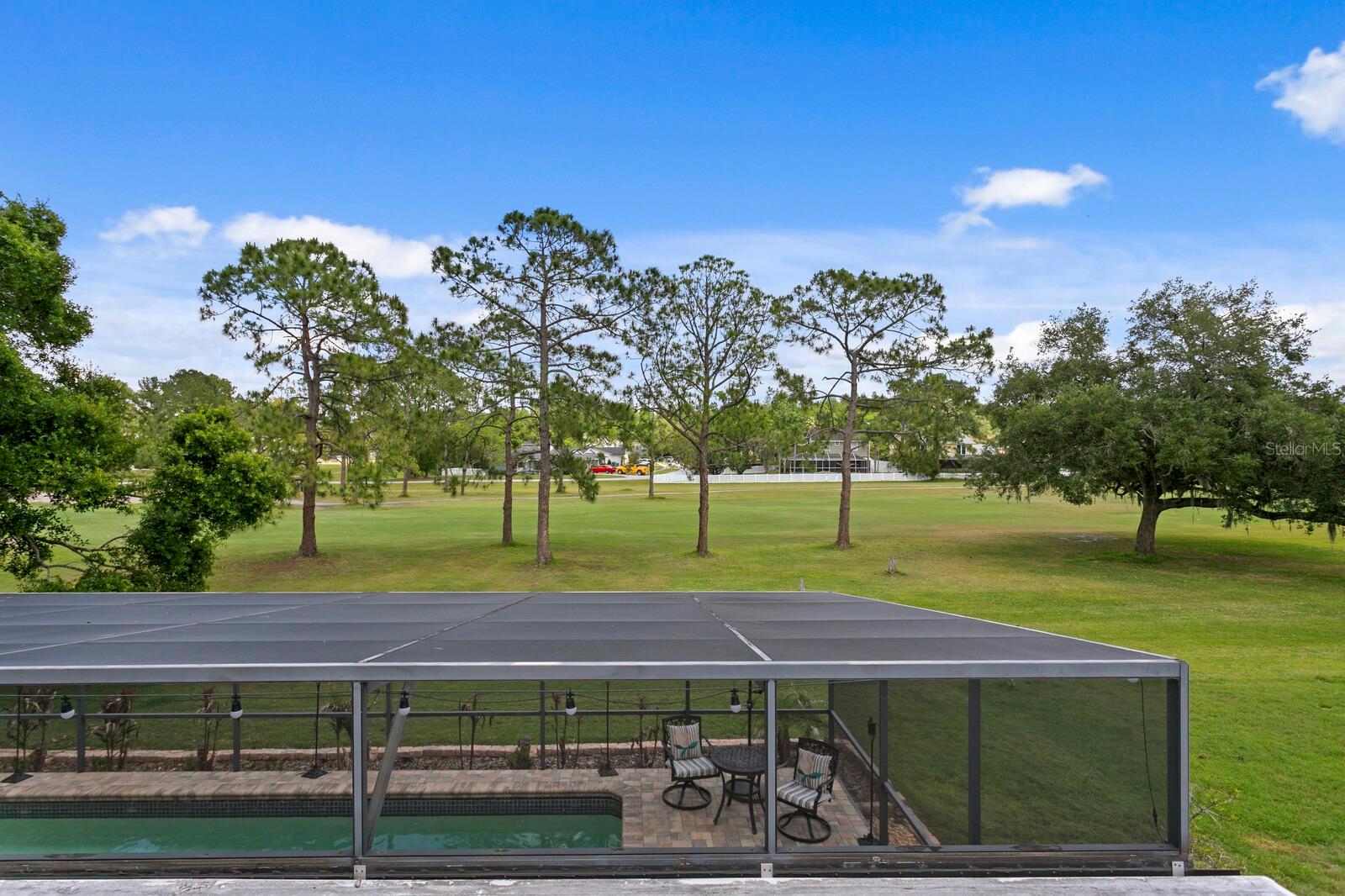 Additional open-air balcony with golf course views from 2nd floor