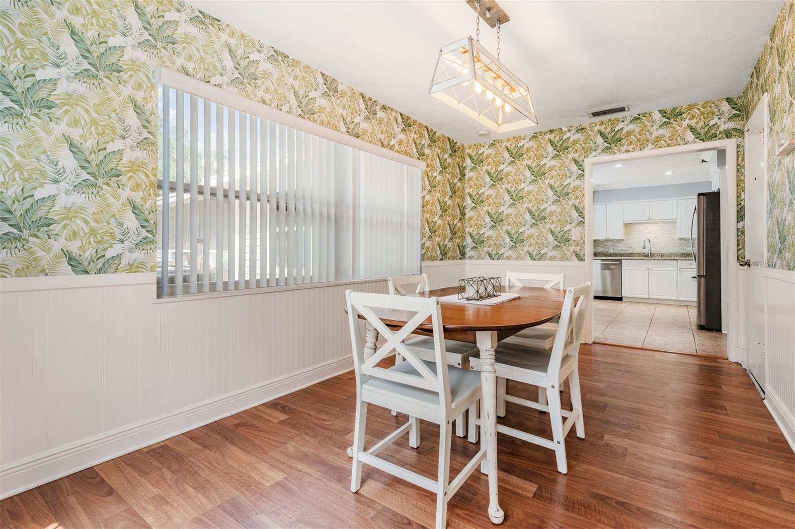 This is a great space for family gatherings offering plenty of room for an expanded table seating arrangement.