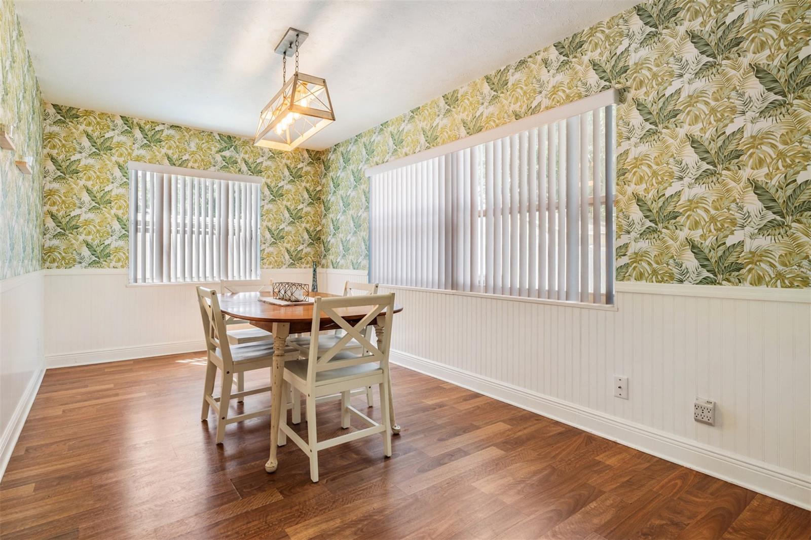 large dining room with beadboard accent walls