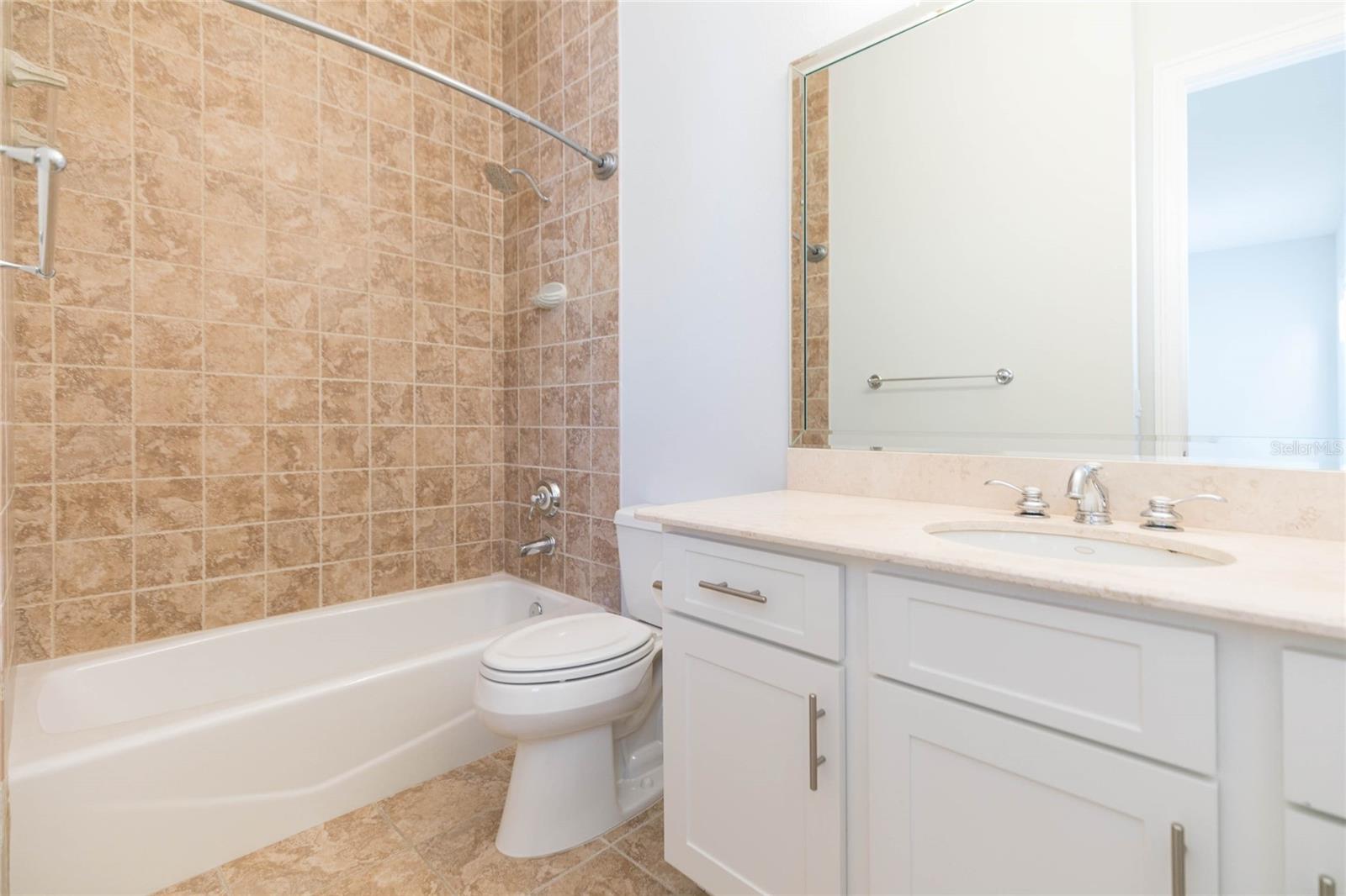 The ensuite is modern, upgraded...
