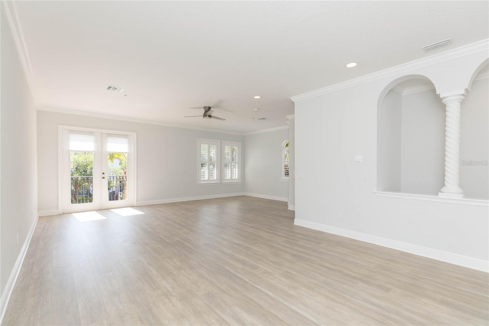 Great Room with French Doors leads to balcony and views.