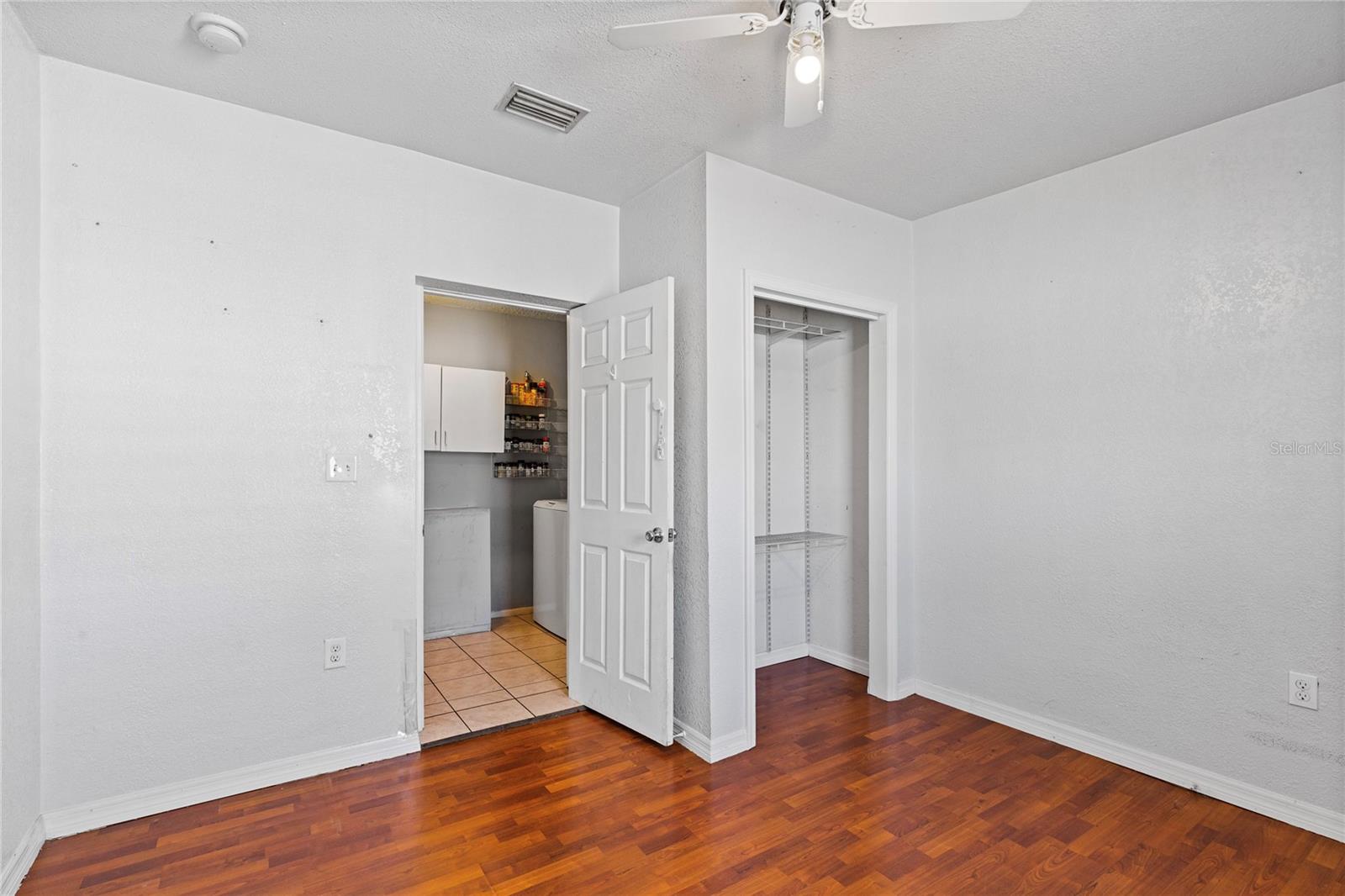 3rd bedroom with engineered hardwood floors