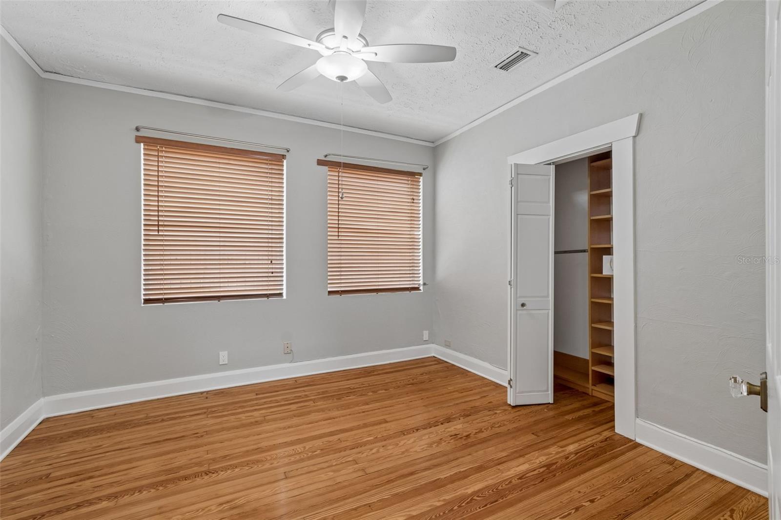 Bedroom with dual closets