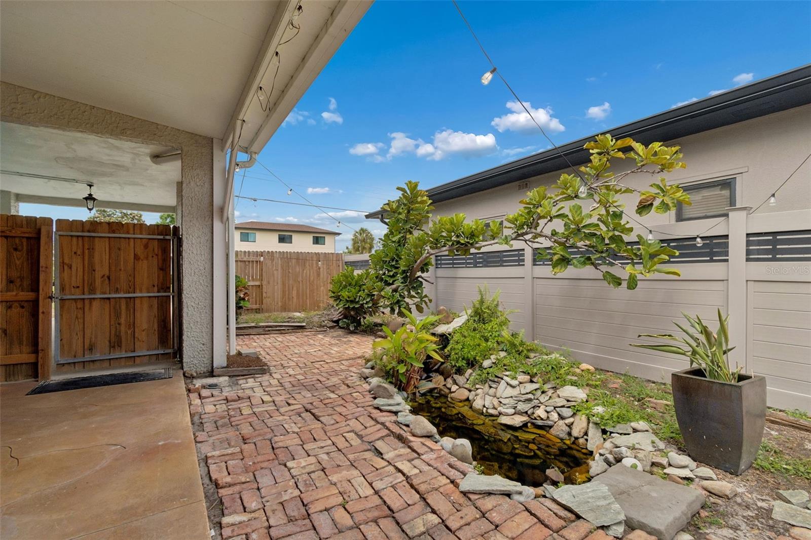 Side courtyard with tranquil water feature