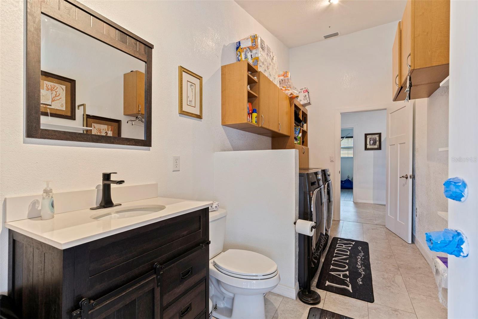 Pool Bath access and laundry room