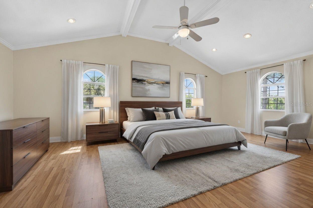 Upstairs Primary Bedroom plumbed for a kitchenette and has washer dryer in closet