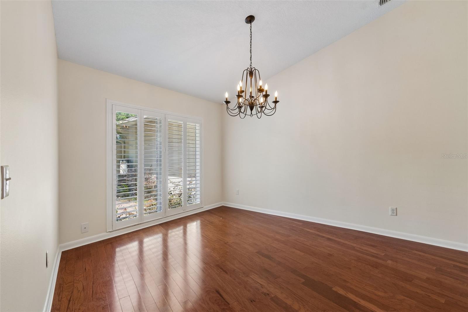 Light & bright dining room - to the left of the entry