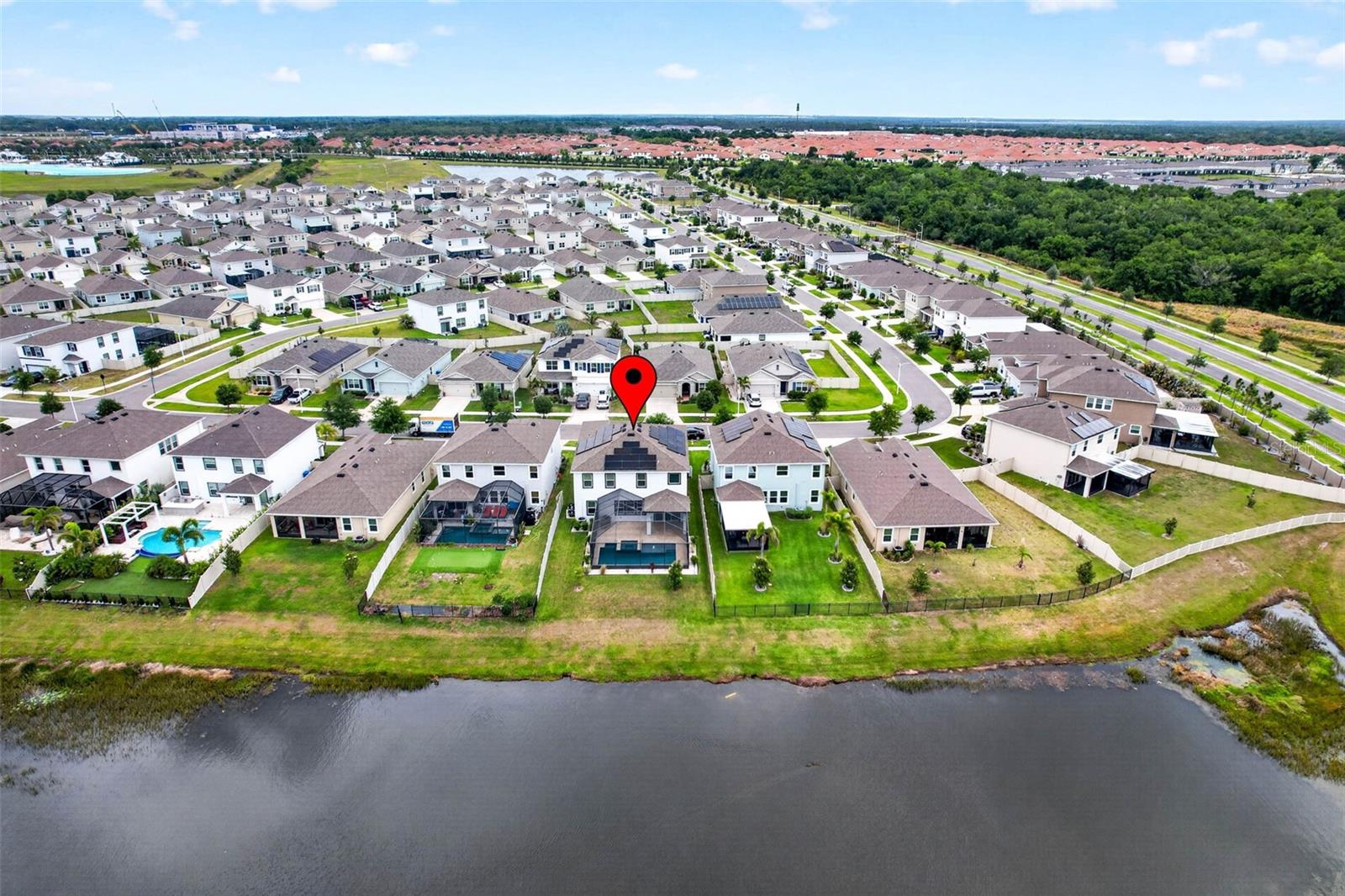 Aerial view of home & neighborhood