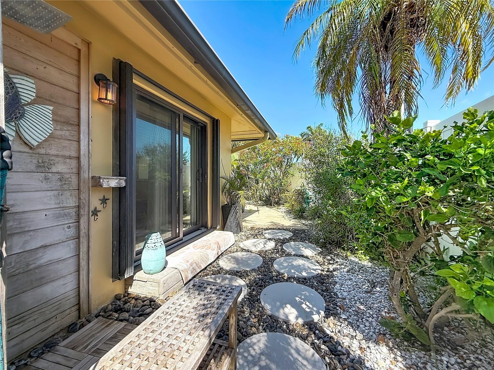 Outdoor shower off primary bedroom