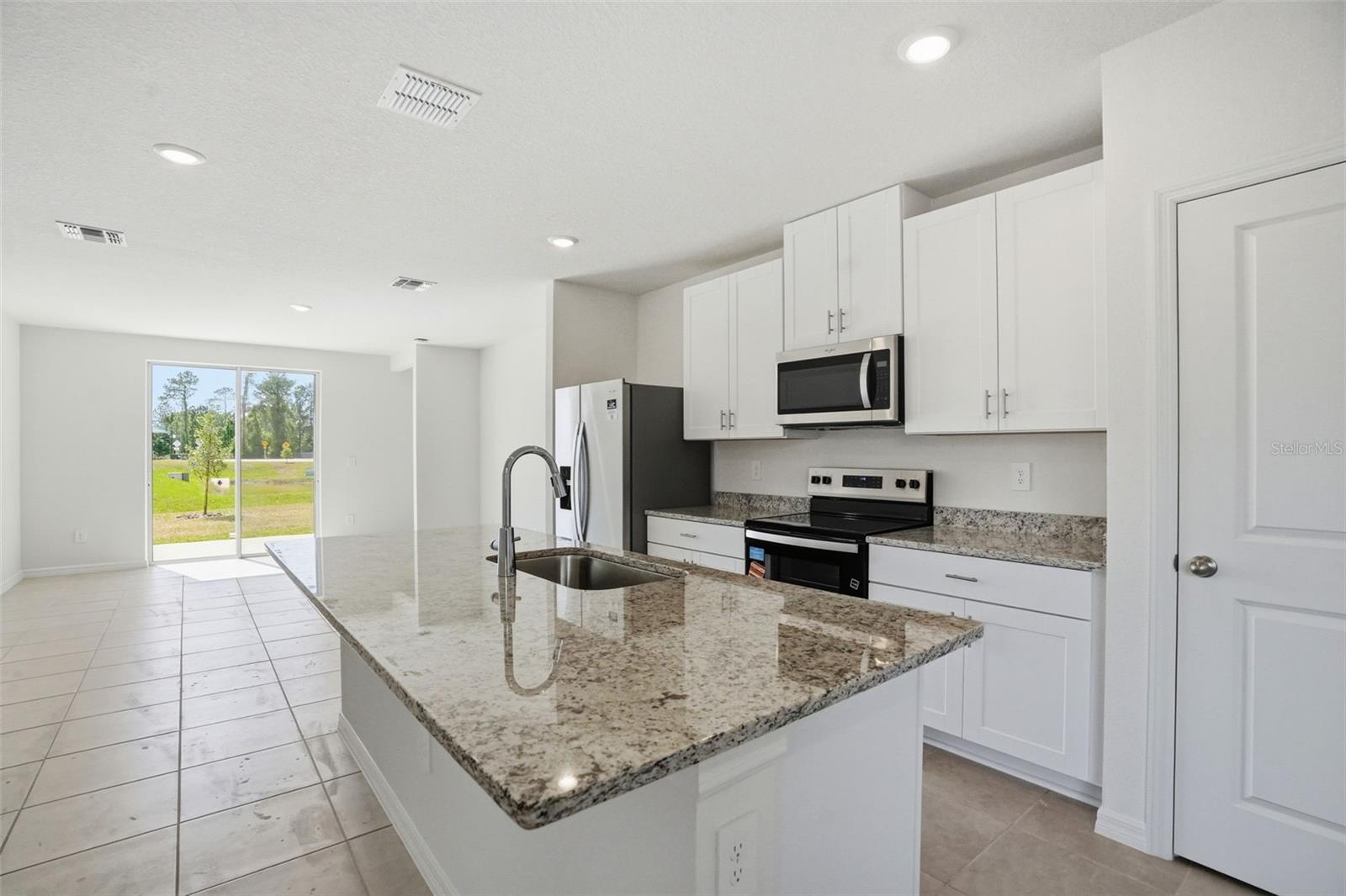 Open Floor Plan with large island breakfast bar.