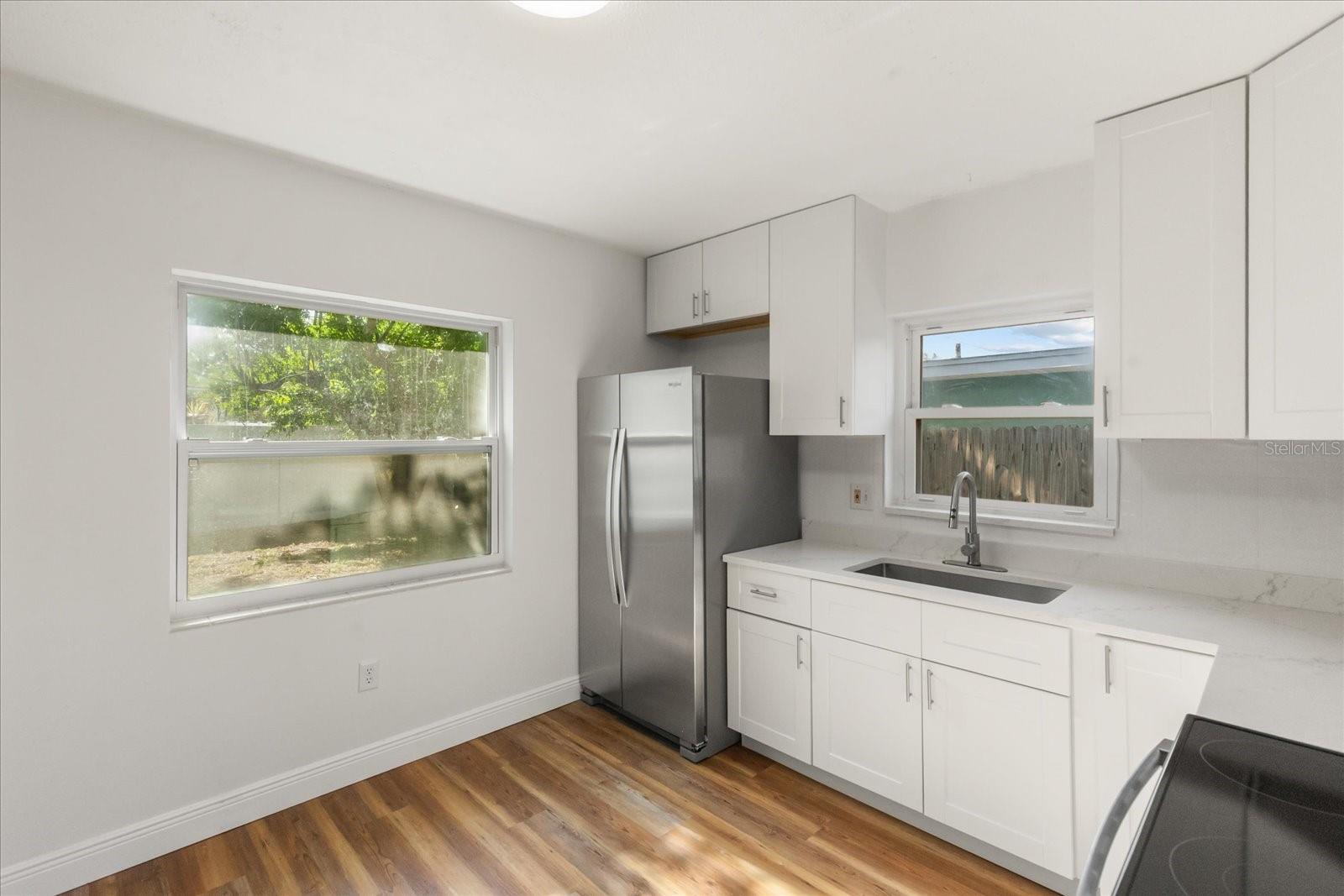 Kitchen w/rear and side windows