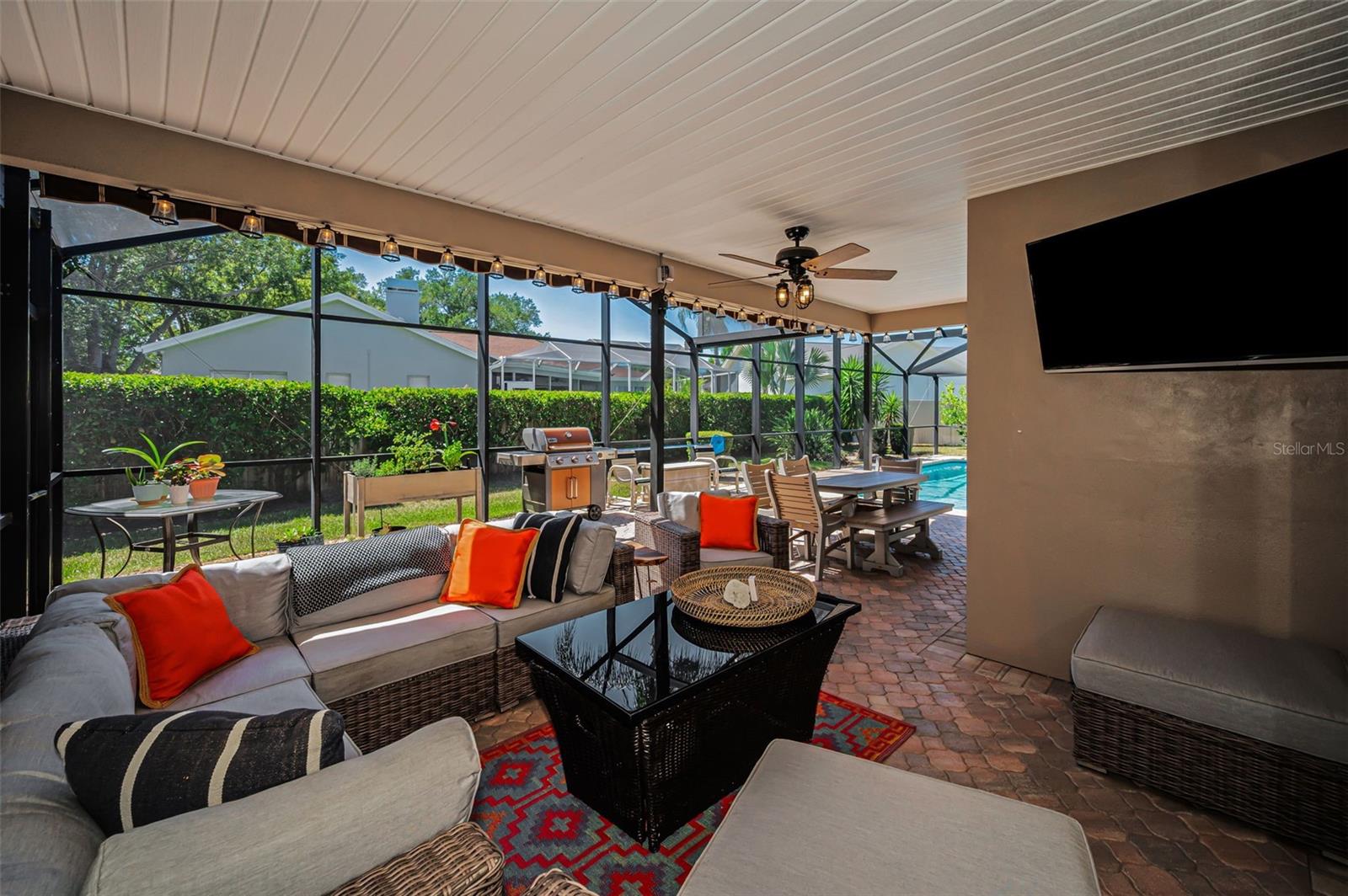Covered Lanai with Remote Controlled Awning & Privacy Shades