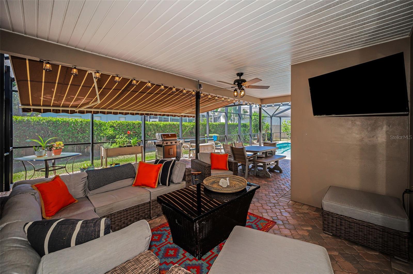 Covered Lanai with Remote Controlled Awning & Privacy Shades