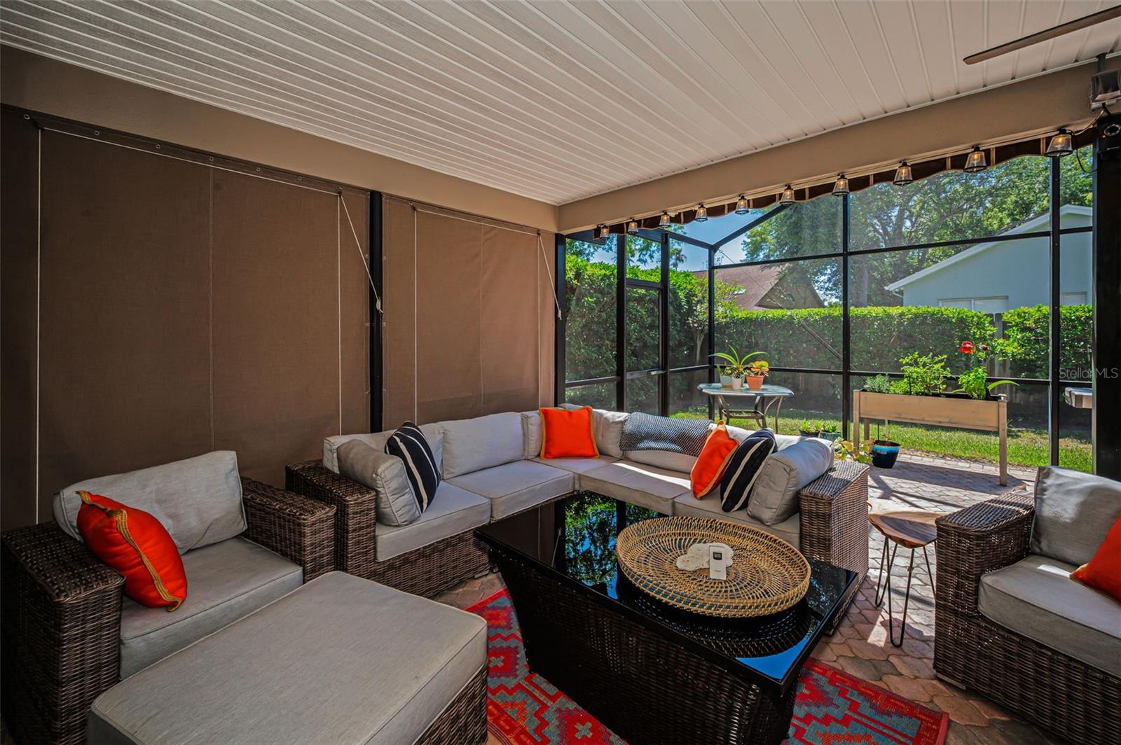 Covered Lanai with Remote Controlled Awning & Privacy Shades