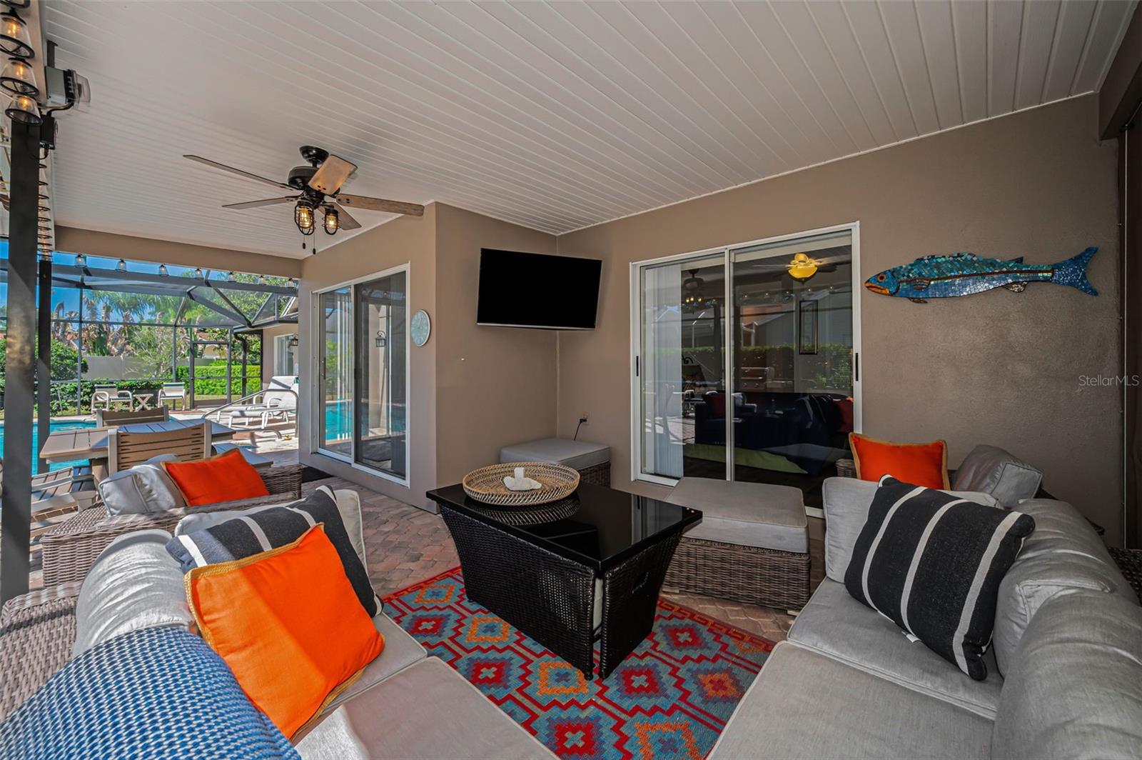 Covered Lanai with Remote Controlled Awning & Privacy Shades