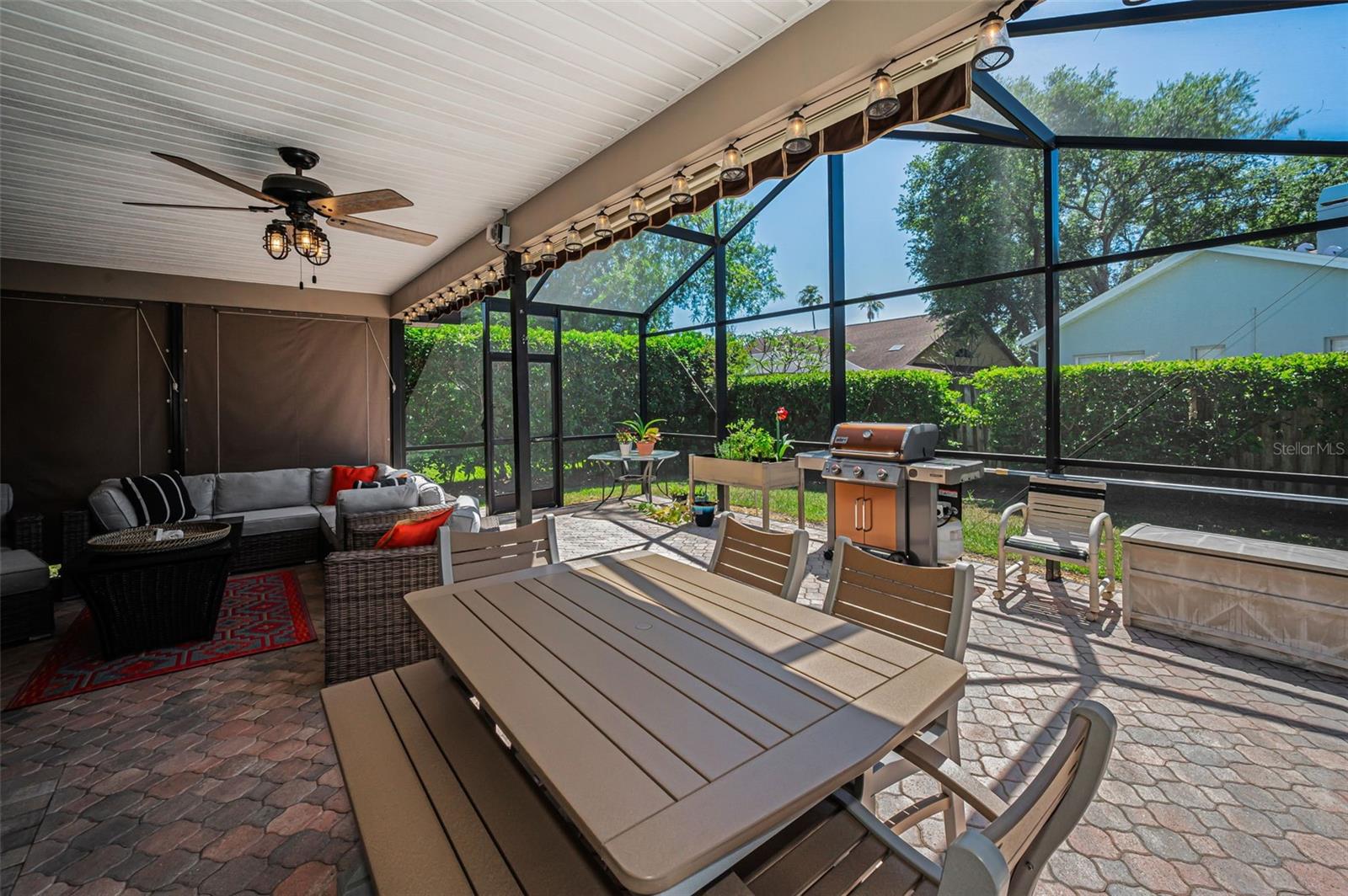 Covered Lanai with Remote Controlled Awning & Privacy Shades