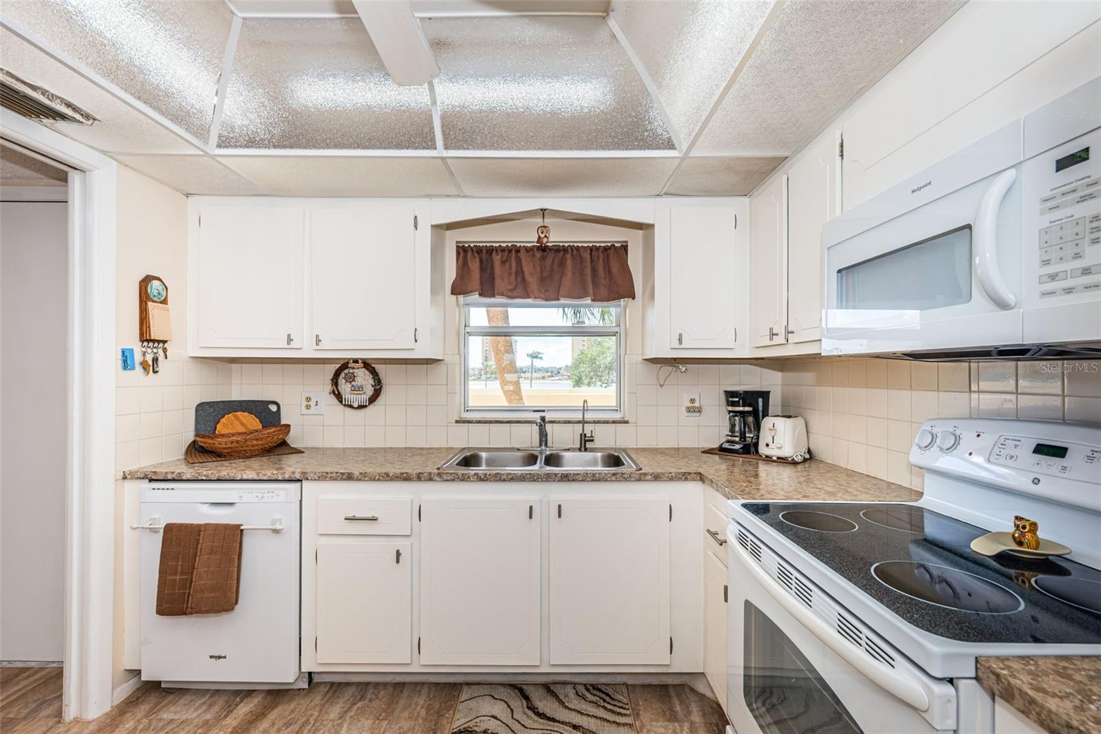 Kitchen with wood cabinets