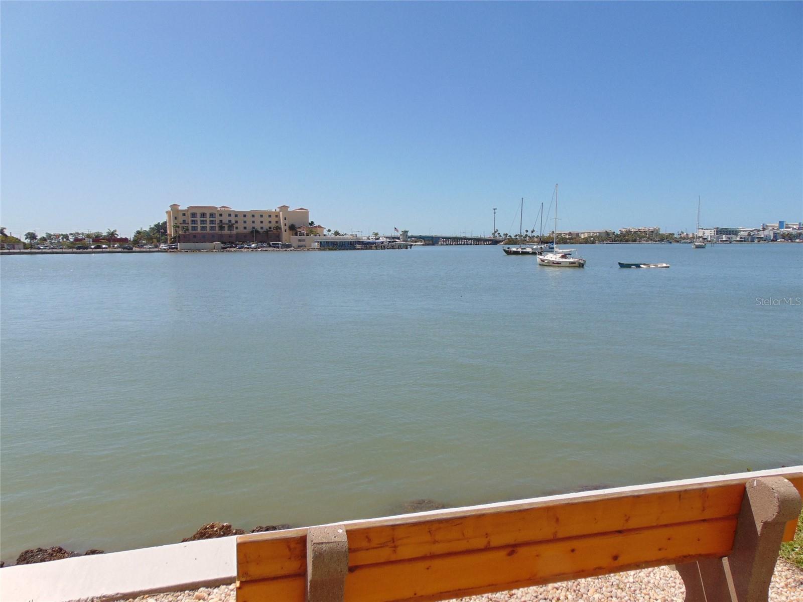 Cross the yard to the waterfront bench, and contemplate the water's beauty!
