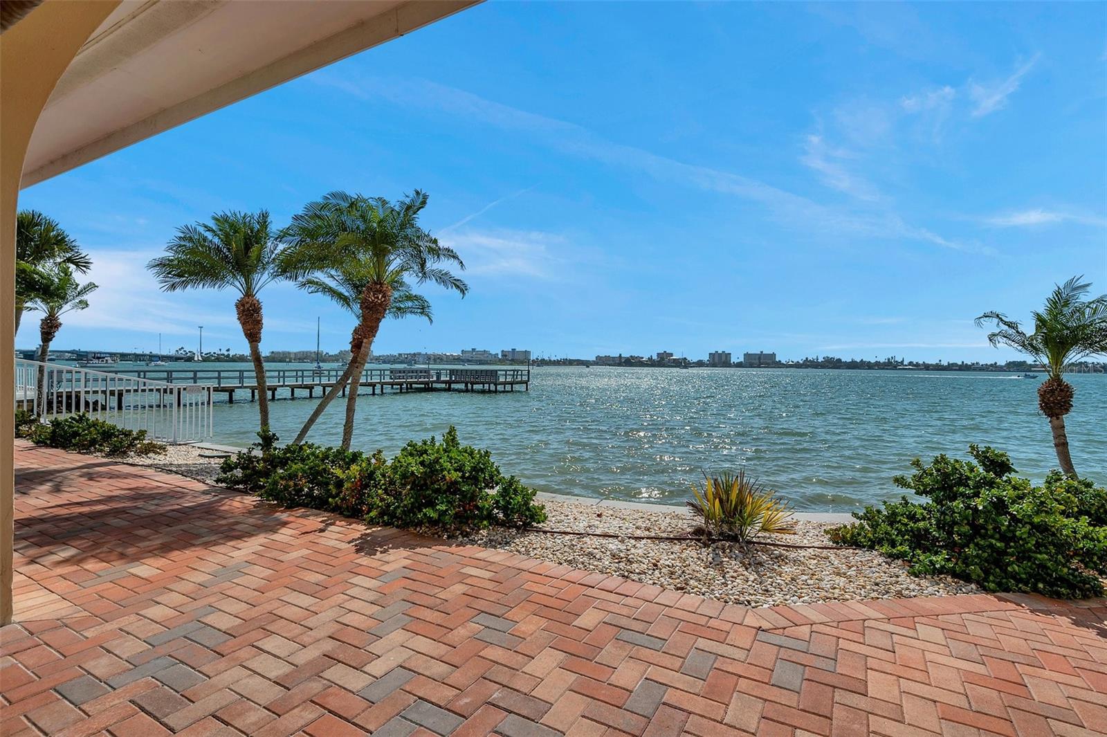 Sit out here and watch the boats glide by.