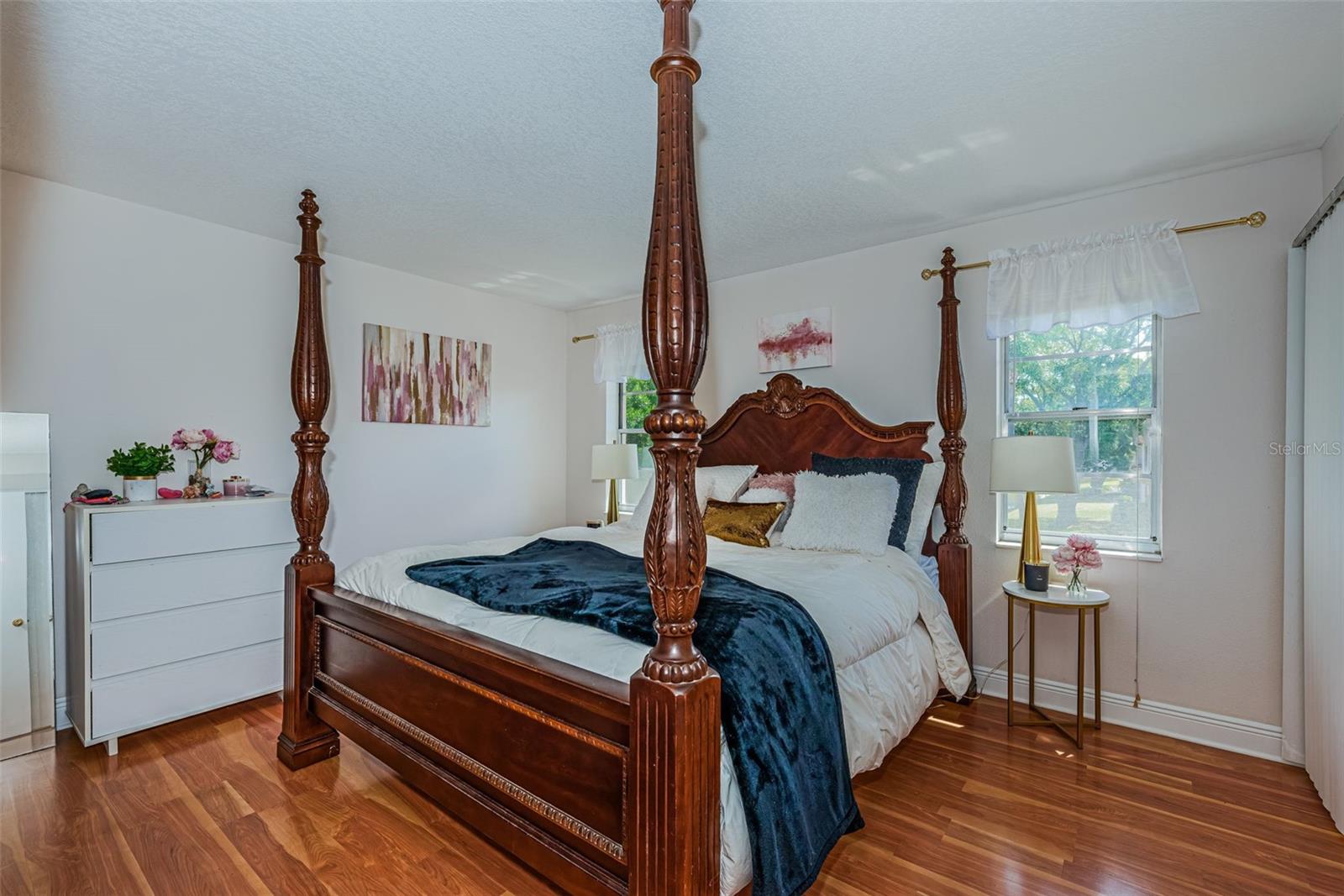 Bedroom with Luxury Vinyl floors.