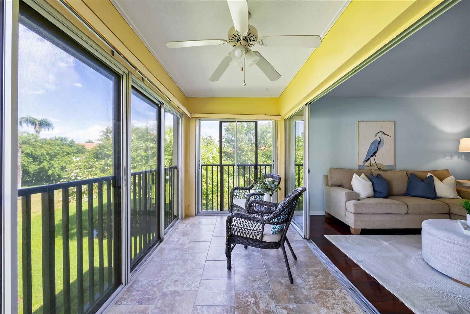 Sunroom walls are open to living room.