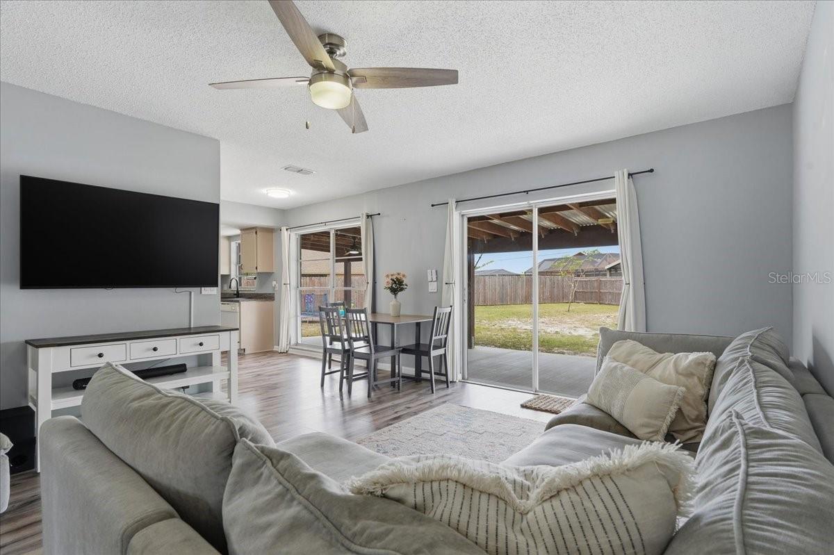 LUXURY VINYL WOOD PLANK FLOORING IN THE MAIN LIVING AREAS