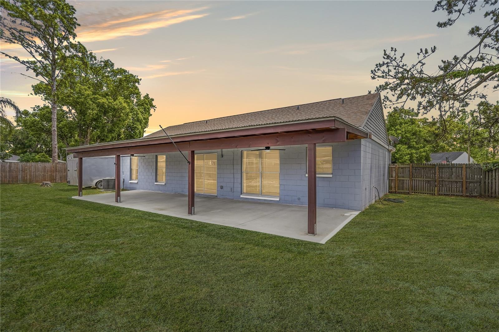 COVERED, EXPANSIVE REAR PATIO!