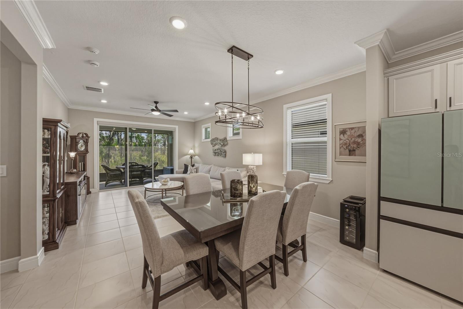 Dining Area with Crown Molding and Upgraded lighting package
