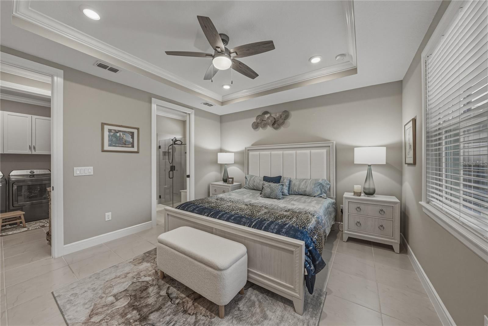 Oversized Primary Suite with King Bed & extra room for settee area long dresser and chair