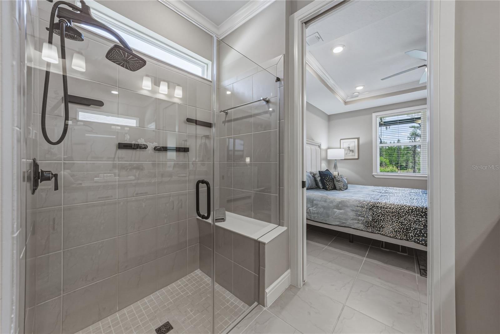 Custom Shower with Multiple Heads, Built in Shower Seat & Frameless Glass Door