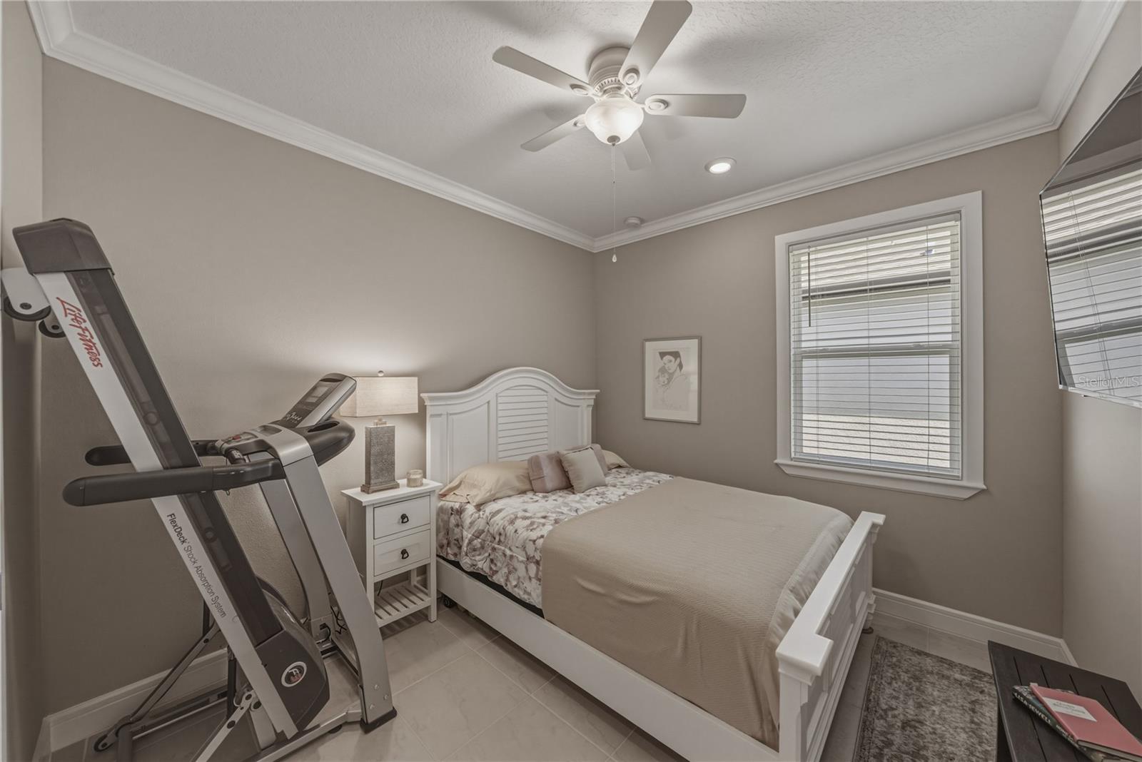 Second Bedroom with Crown Molding, Walk in Closet built in with California Closets