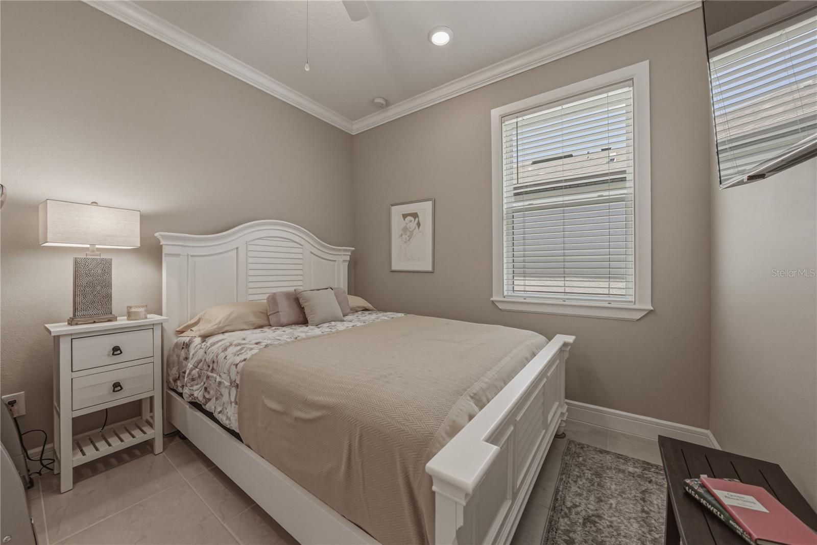 Second Bedroom with Crown Molding and upgraded Lighting Package