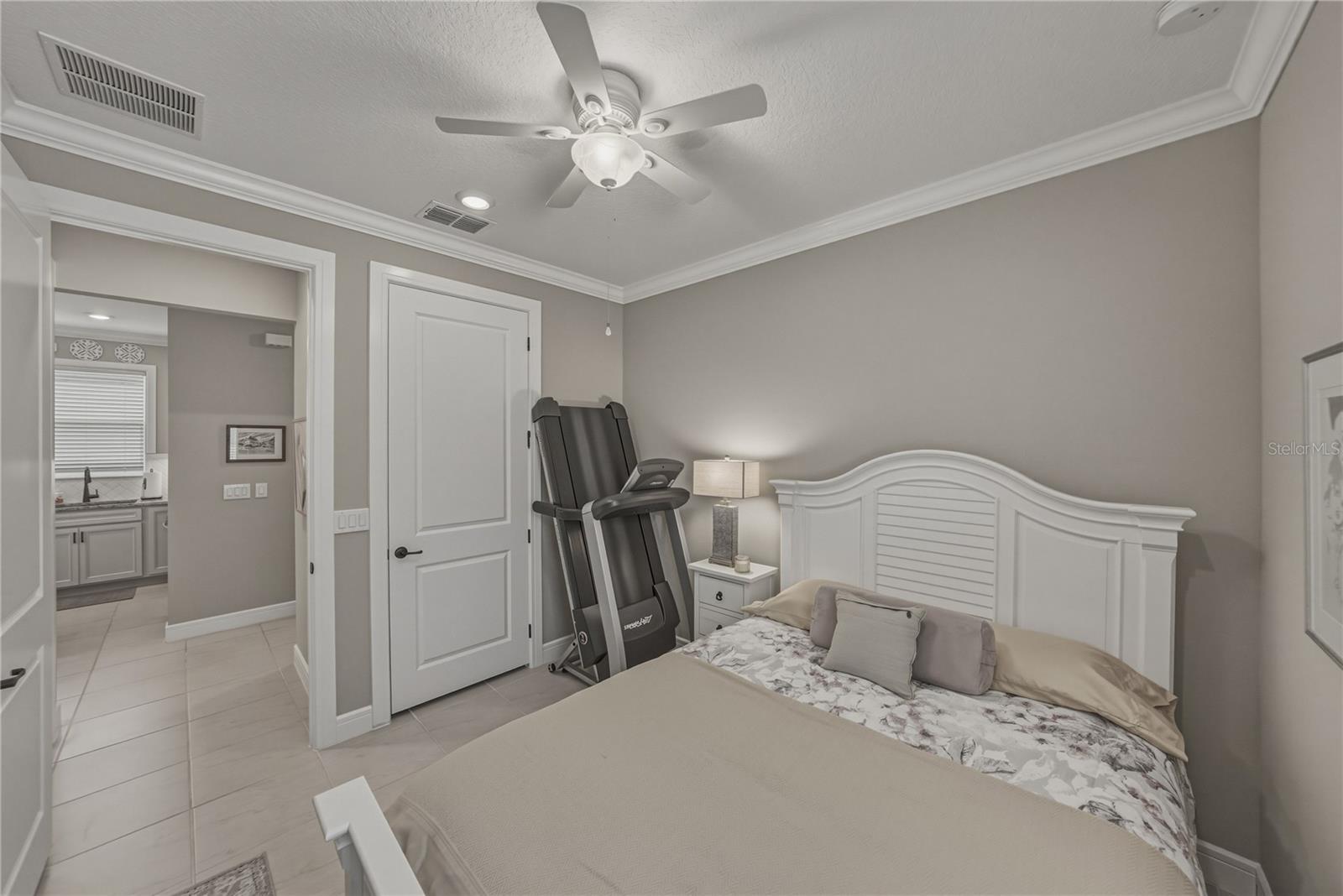 Second Bedroom with Crown Molding, Walk in Closet built in with California Closets