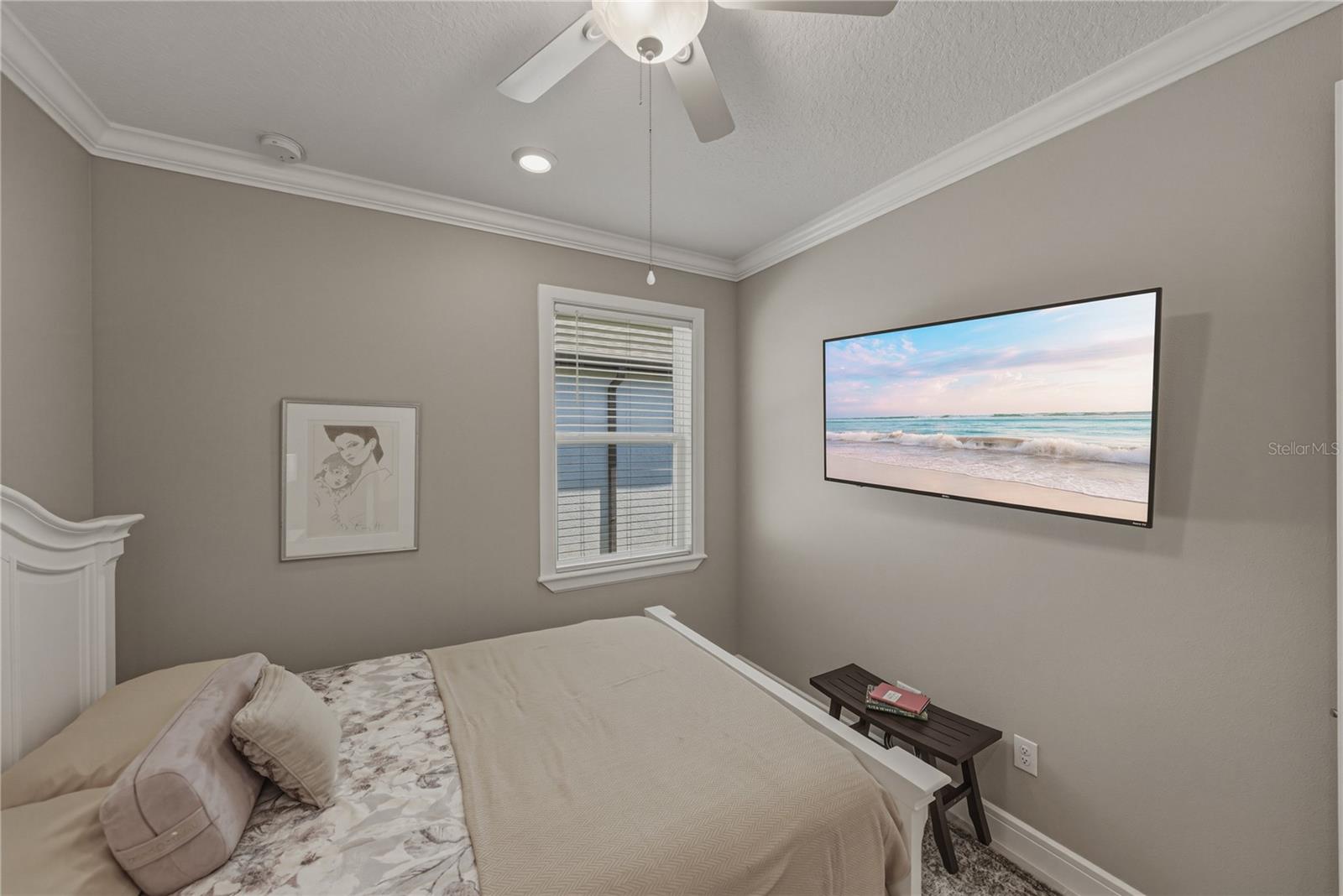 Second Bedroom with Crown Molding and upgraded Lighting Package