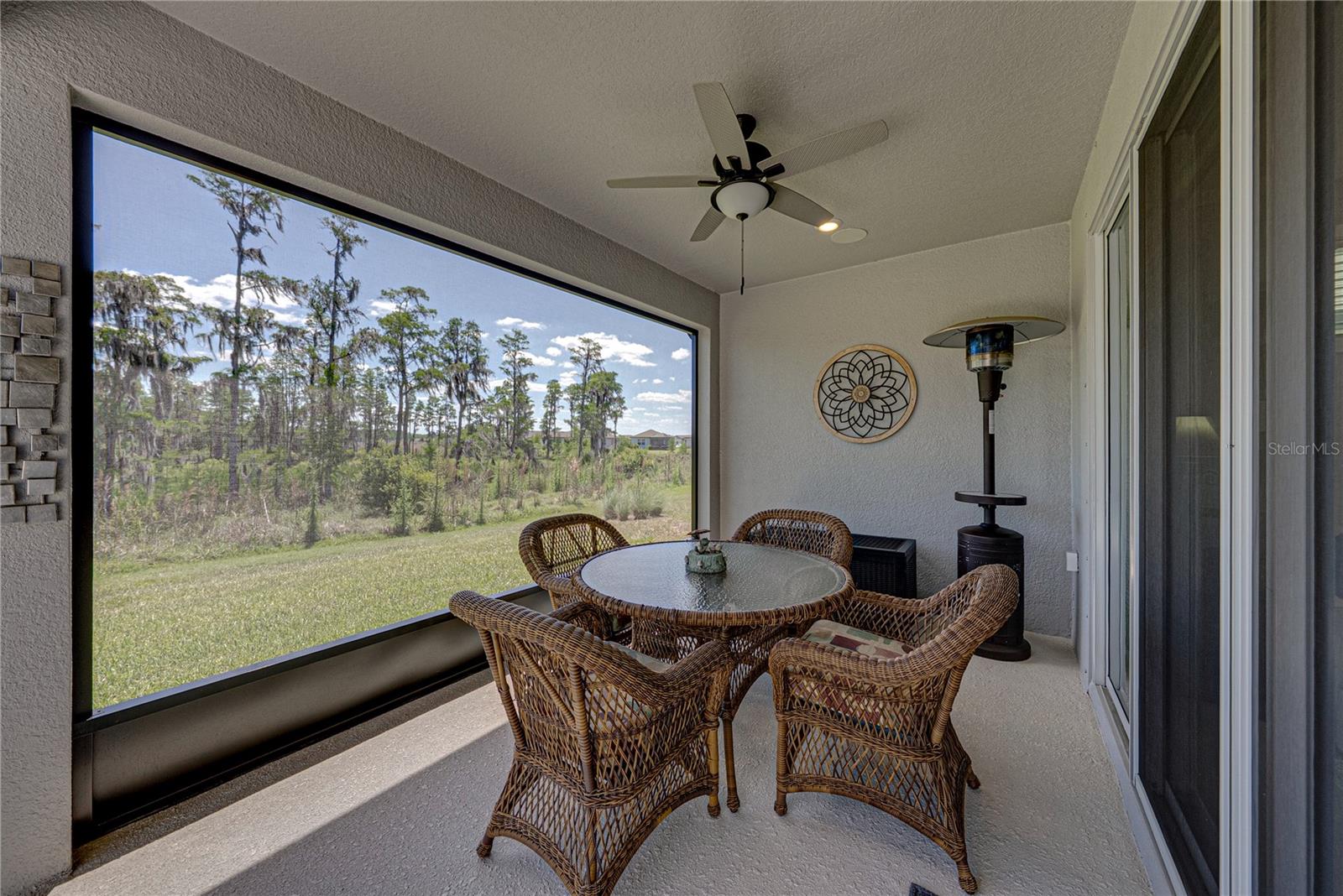 Covered Screened Lanai pre plumbed and stubbed for Outdoor Kitchen