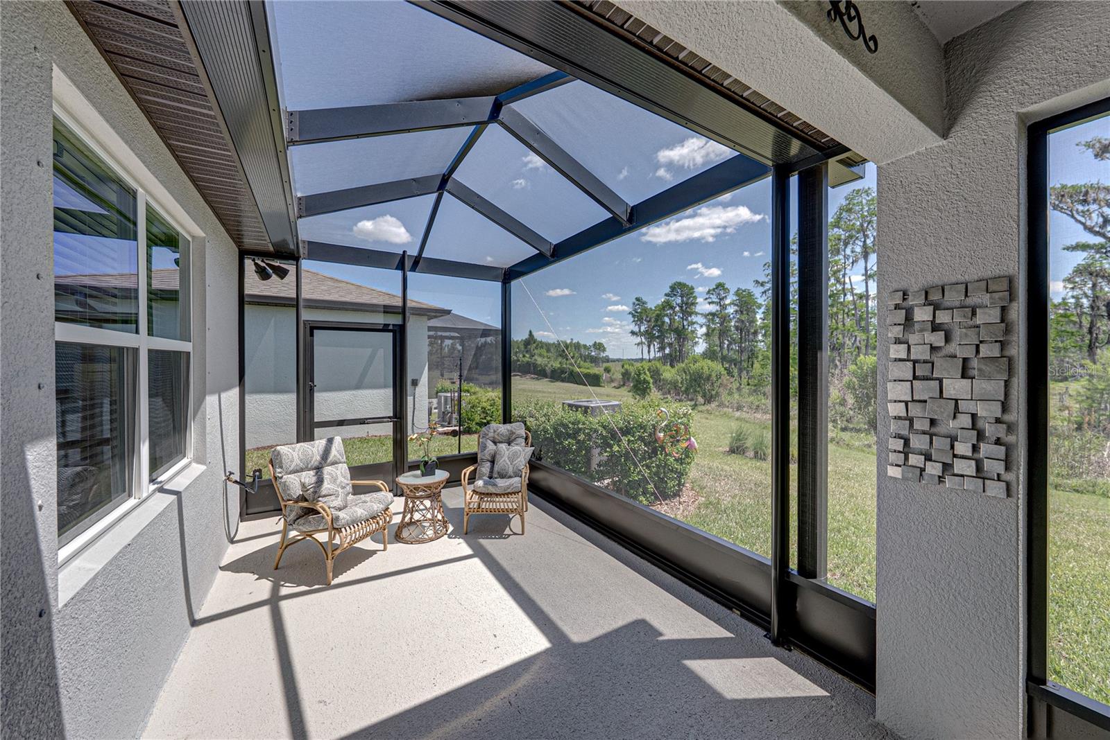 Covered Screened and Extended Lanai on Private Conservation