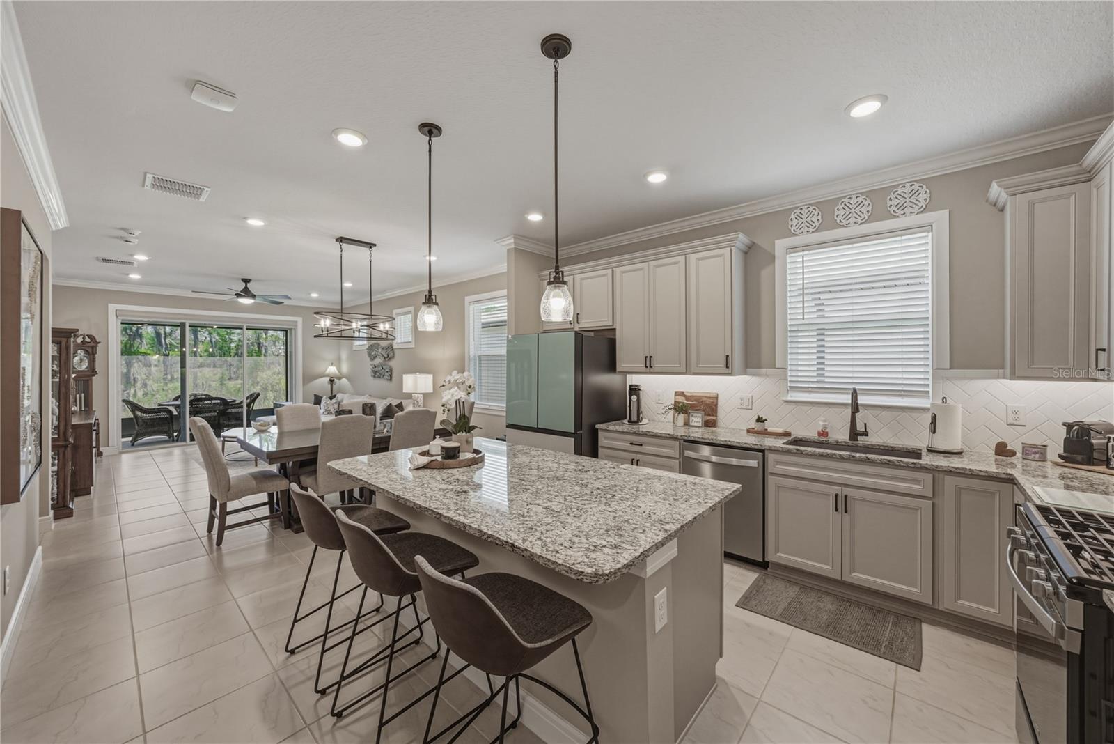 Gourmet Kitchen with upgraded Stainless Gas Appliances