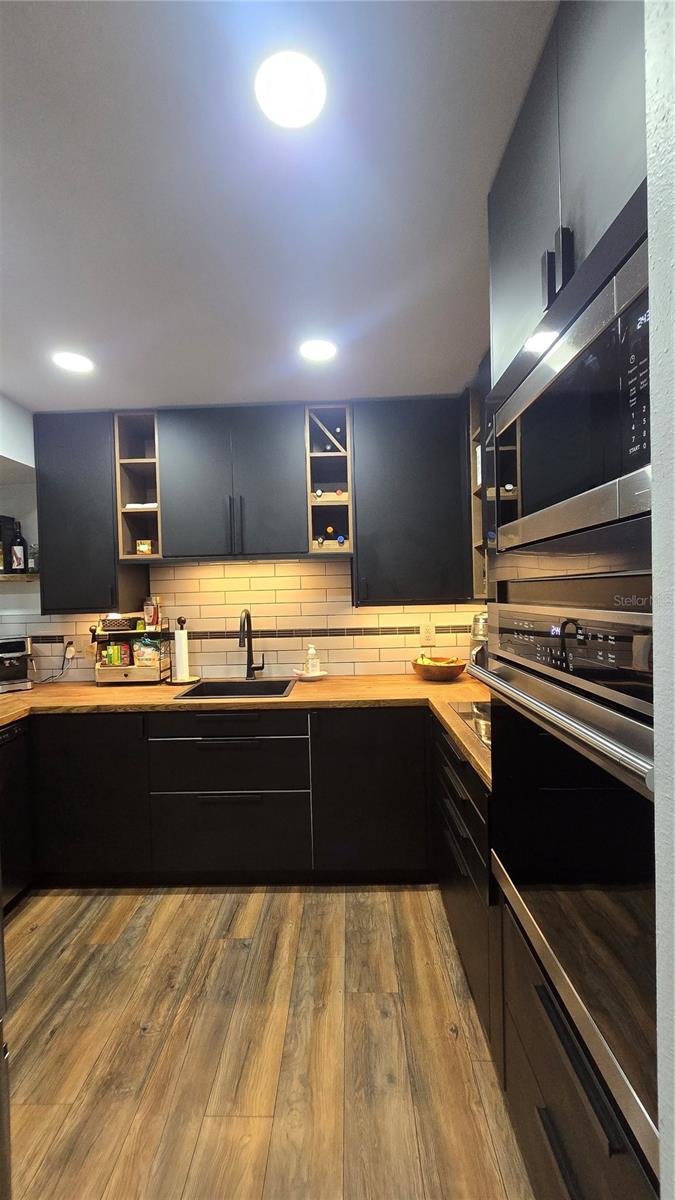 Stainless steel appliances are all newer.