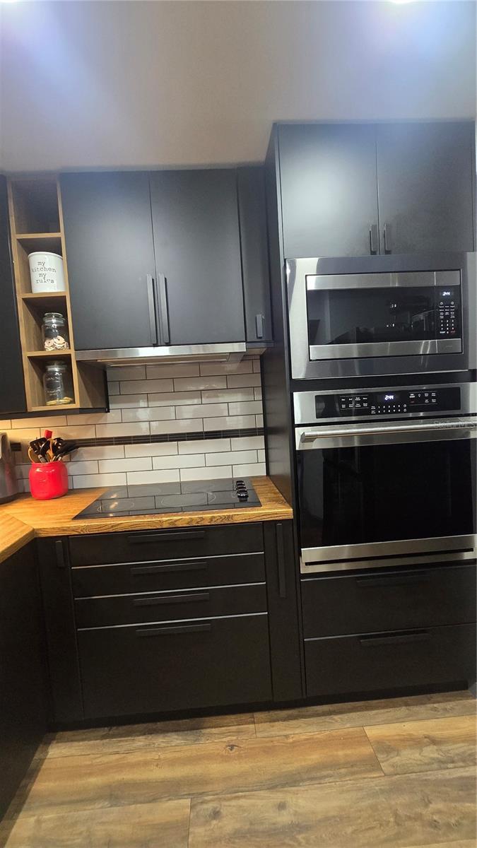 Built in microwave and oven.  Don't miss the really cool vent above the range that you pull out (its the silver bar).