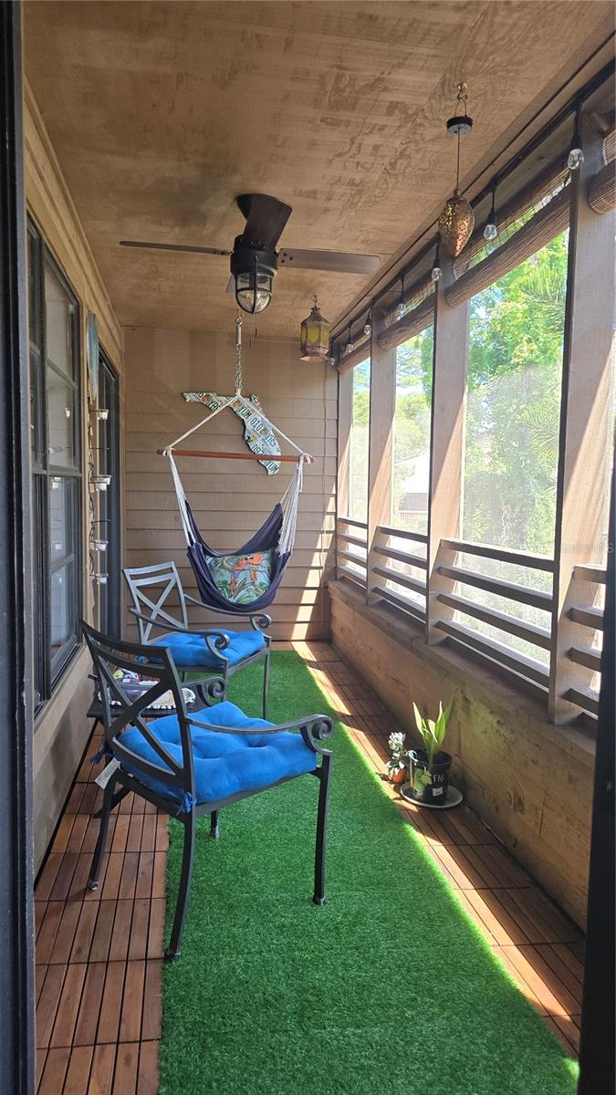 A really cool place to hang out, relax or enjoy family and friend time. This screened in lanai is bigger than it looks in the picture.  It originally had 4 chairs, 2 side tables and more plants.