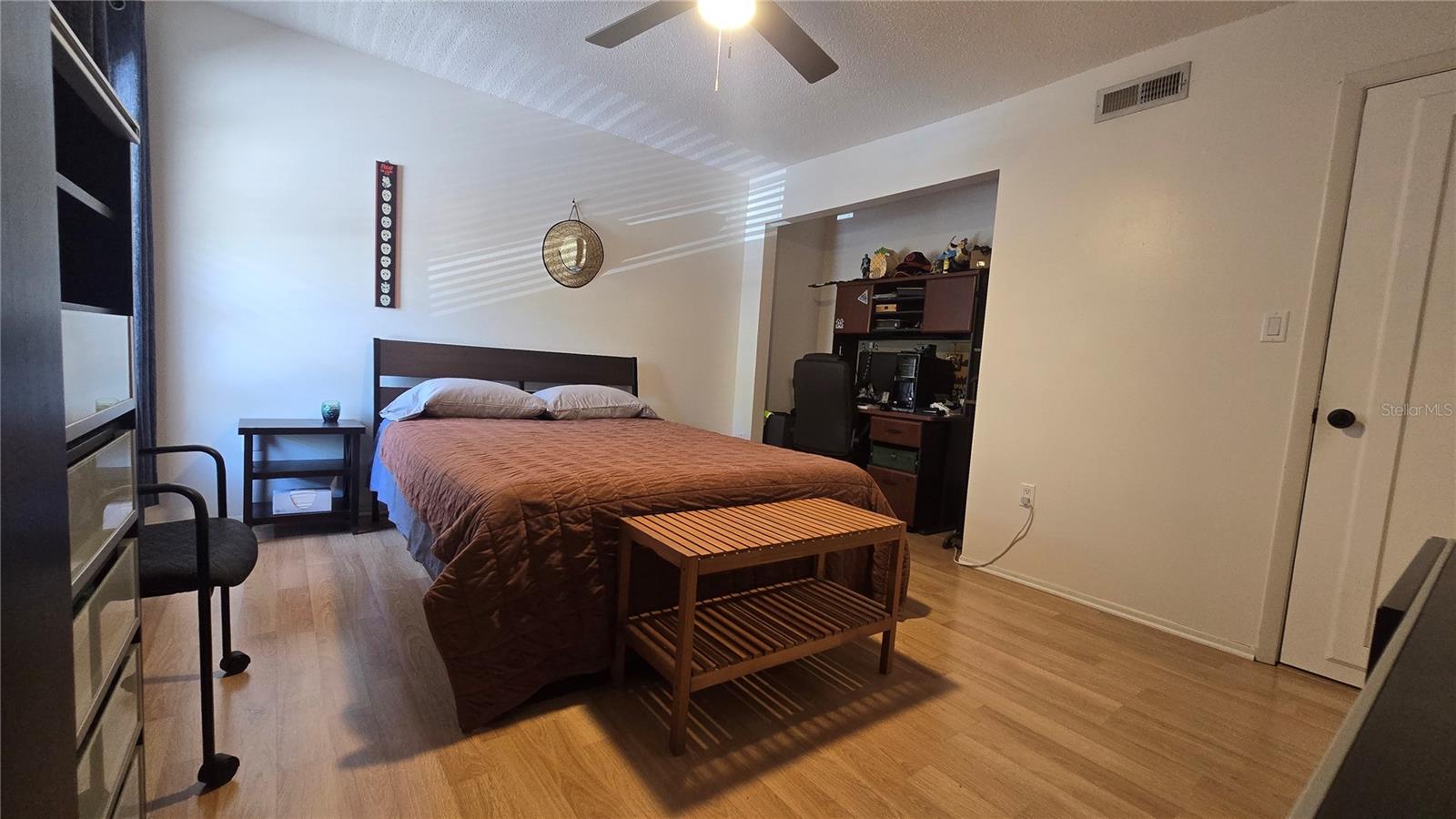 Another view of the 2nd bedroom.  The closet is so big, there's an entire office in there!