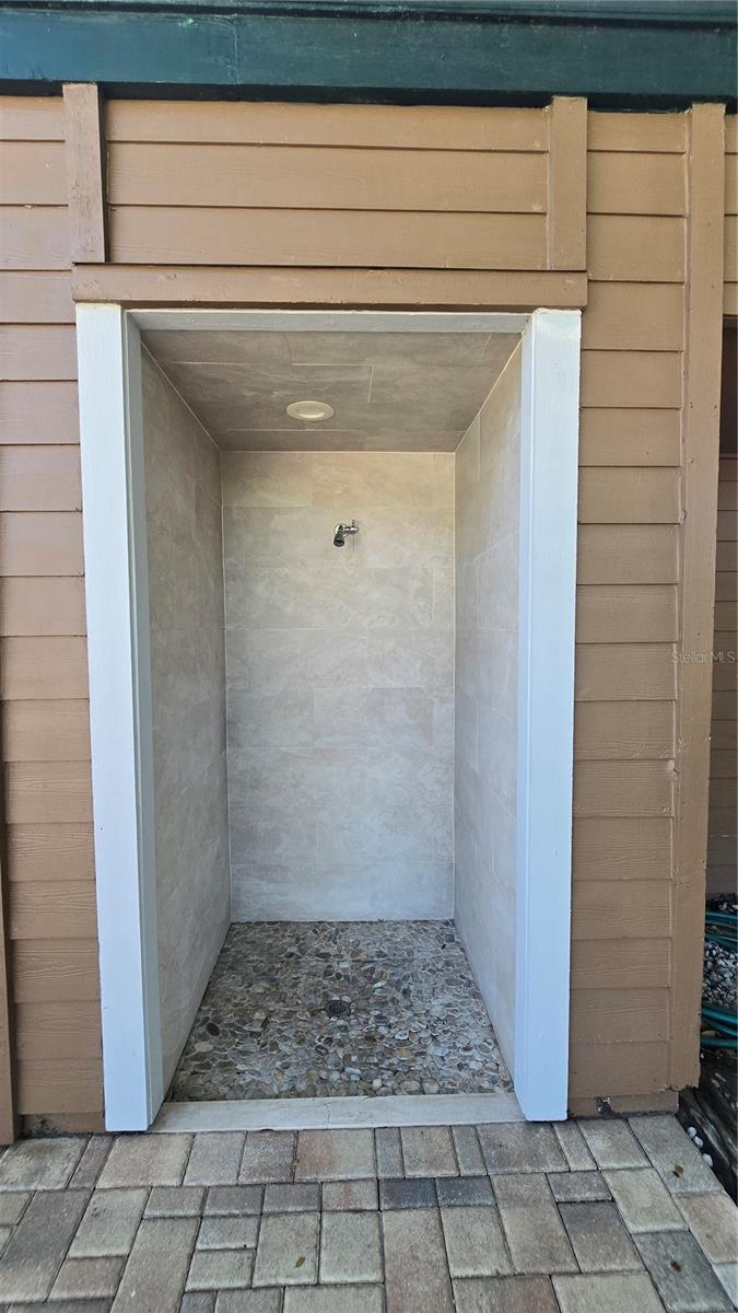 Use the outdoor shower here at the pool to rinse off.