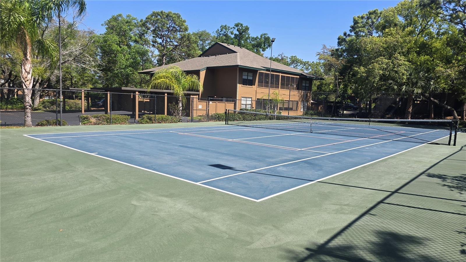 Hours of fun awaits you here at the tennis/pickleball courts.  You can even play after dark as lights are available.