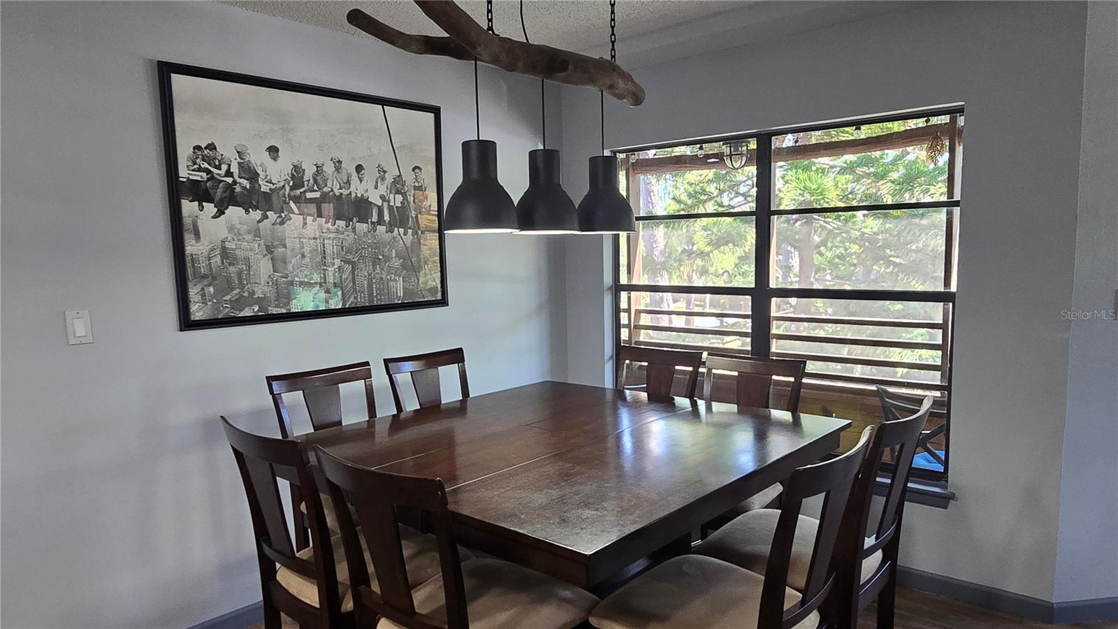 The dining room offers views of the outdoors.