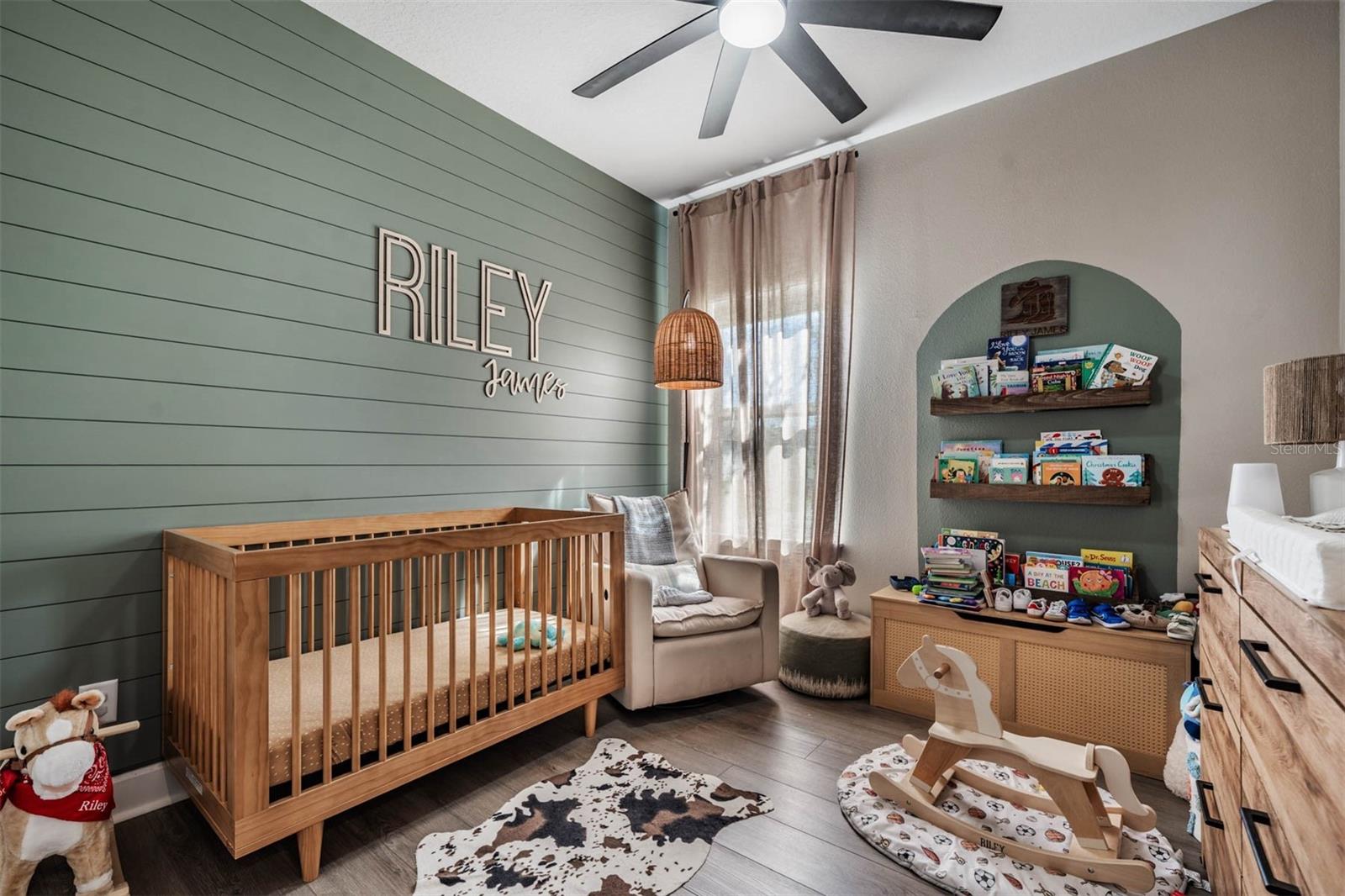 2nd bedroom with ship lap accent wall
