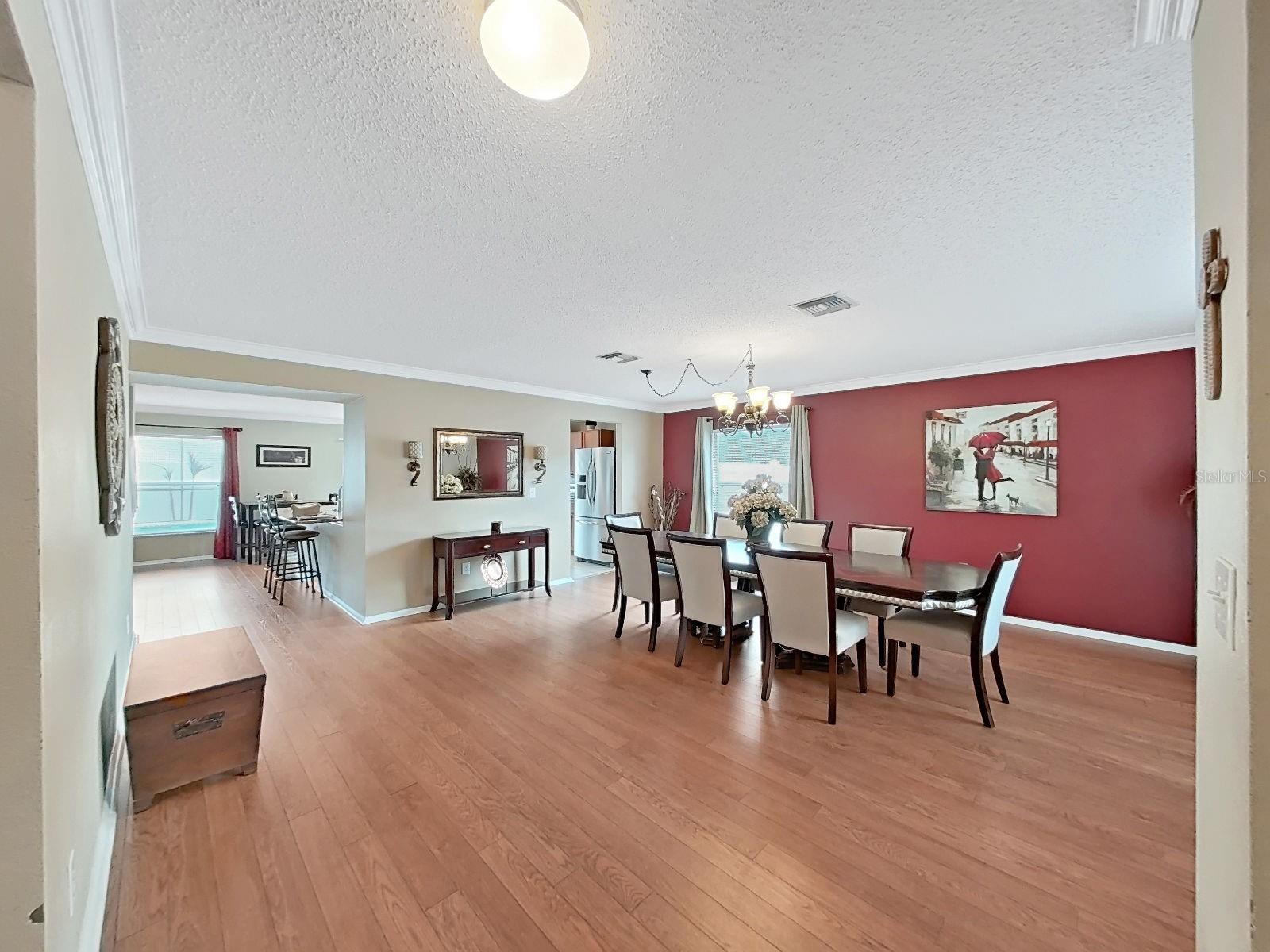Open concept flow from the dining room to the kitchen.