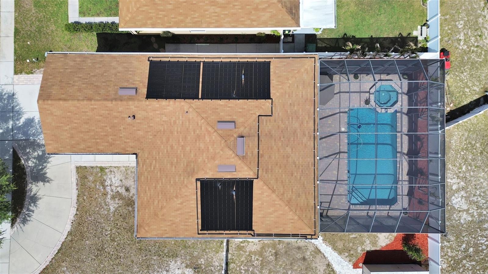 Resort-ready with solar panels (fully owned) to heat the screened pool and spa!